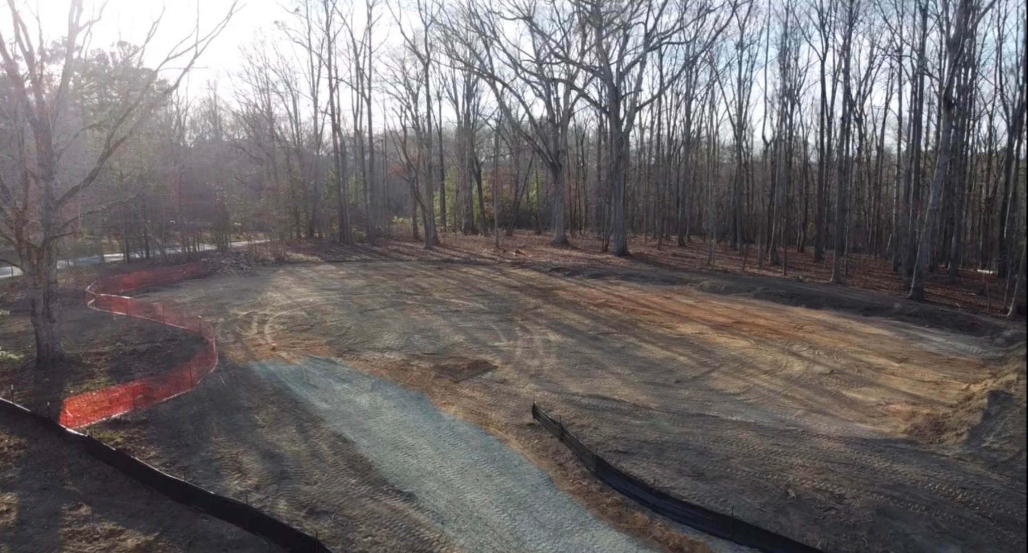 Prepared and graded site with erosion control measures